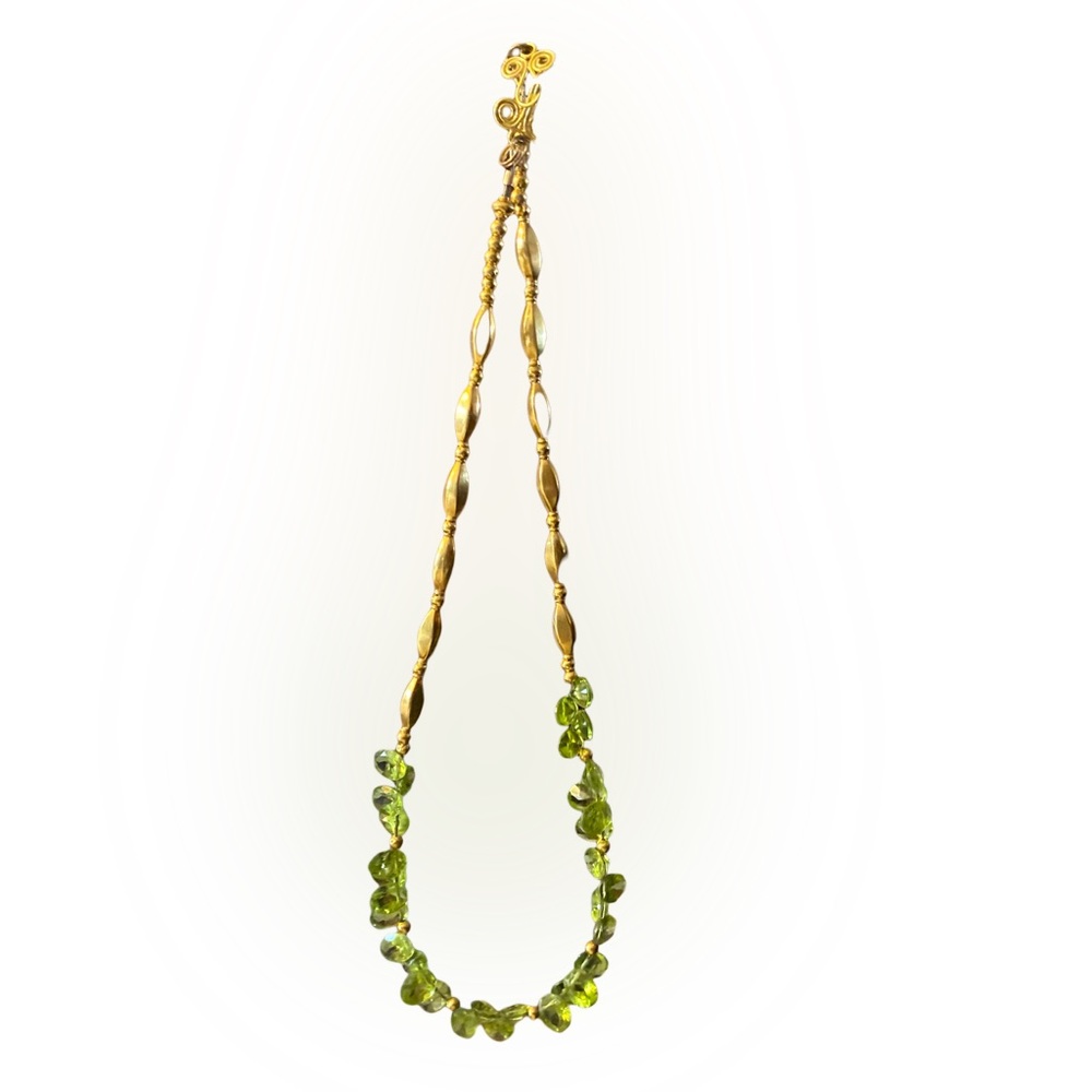 Peridot necklace with gold tone beading